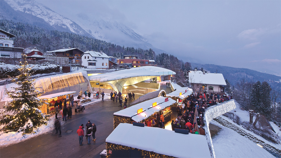 The Christmas market on the Hungerburg mountain with a panoramic view of the city of Innsbruck.