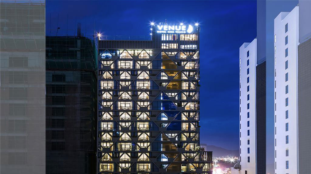 Venue Hotel with contemporary architectural style combining harmonious colors.